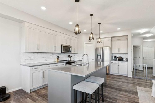 57 Crestridge Bay Sw, Calgary, AB - Indoor Photo Showing Kitchen With Stainless Steel Kitchen With Upgraded Kitchen