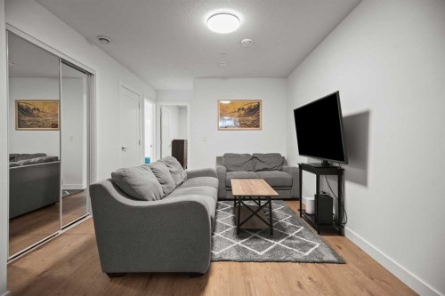 7581 202 Avenue Se, Calgary, AB - Indoor Photo Showing Living Room