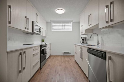 7581 202 Avenue Se, Calgary, AB - Indoor Photo Showing Kitchen With Upgraded Kitchen