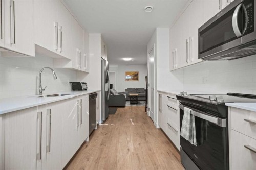 7581 202 Avenue Se, Calgary, AB - Indoor Photo Showing Kitchen With Stainless Steel Kitchen With Upgraded Kitchen