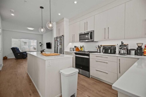 7581 202 Avenue Se, Calgary, AB - Indoor Photo Showing Kitchen With Upgraded Kitchen