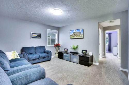 100 Redstone Parade Ne, Calgary, AB - Indoor Photo Showing Living Room