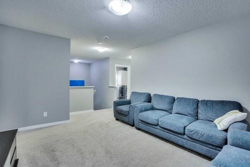 100 Redstone Parade Ne, Calgary, AB - Indoor Photo Showing Living Room
