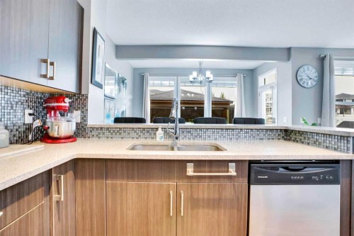 100 Redstone Parade Ne, Calgary, AB - Indoor Photo Showing Kitchen With Double Sink