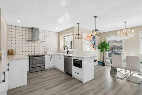 220 Macewan Glen Place Nw, Calgary, AB - Indoor Photo Showing Kitchen With Upgraded Kitchen