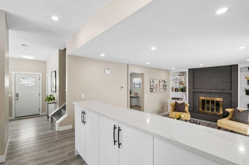 220 Macewan Glen Place Nw, Calgary, AB - Indoor With Fireplace