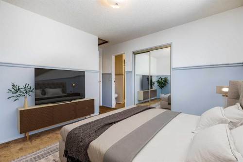 21 Mountain Circle Se, Airdrie, AB - Indoor Photo Showing Bedroom