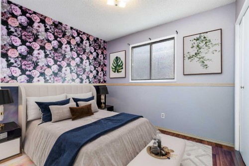 21 Mountain Circle Se, Airdrie, AB - Indoor Photo Showing Bedroom