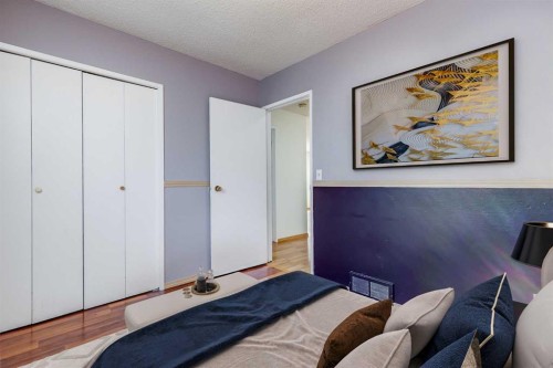 21 Mountain Circle Se, Airdrie, AB - Indoor Photo Showing Bedroom