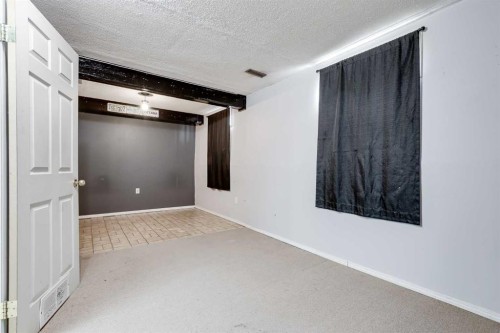 21 Mountain Circle Se, Airdrie, AB - Indoor Photo Showing Other Room