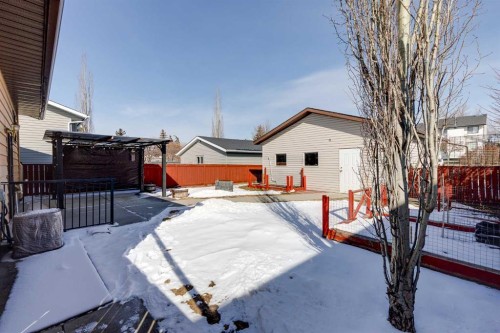 21 Mountain Circle Se, Airdrie, AB - Outdoor With Deck Patio Veranda