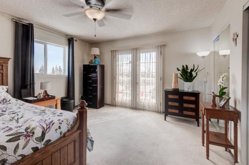 4 Cedargrove Way Sw, Calgary, AB - Indoor Photo Showing Bedroom