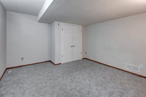 4 Cedargrove Way Sw, Calgary, AB - Indoor Photo Showing Other Room