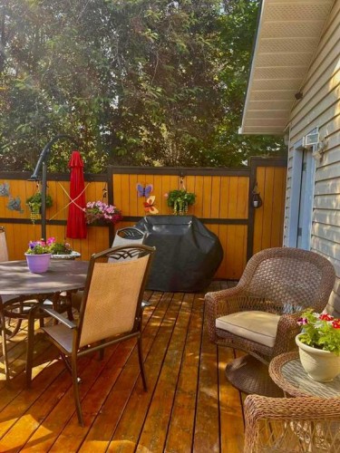 4 Cedargrove Way Sw, Calgary, AB - Outdoor With Deck Patio Veranda
