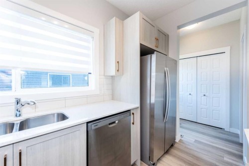568 Legacy Circle Se, Calgary, AB - Indoor Photo Showing Kitchen With Double Sink