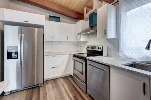 717 67 Avenue Sw, Calgary, AB - Indoor Photo Showing Kitchen With Upgraded Kitchen