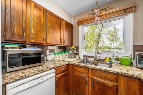 71 Sunmills Drive Se, Calgary, AB - Indoor Photo Showing Kitchen With Double Sink