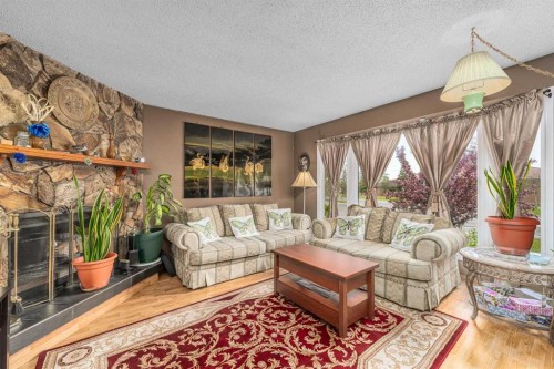 71 Sunmills Drive Se, Calgary, AB - Indoor Photo Showing Living Room With Fireplace