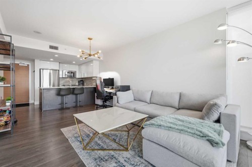 1606-519 Riverfront Avenue Se, Calgary, AB - Indoor Photo Showing Living Room