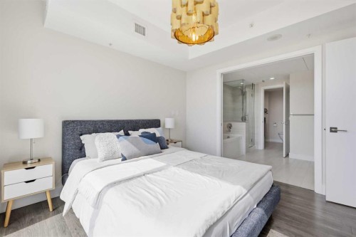 1606-519 Riverfront Avenue Se, Calgary, AB - Indoor Photo Showing Bedroom