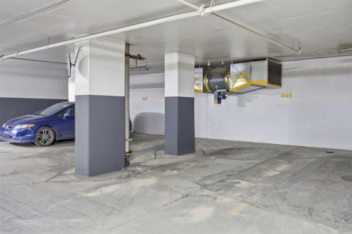 1606-519 Riverfront Avenue Se, Calgary, AB - Indoor Photo Showing Garage