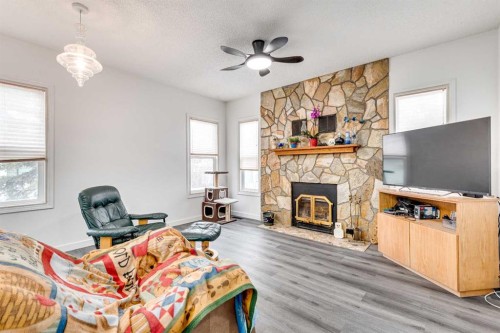 133 6 Avenue Se, Three Hills, AB - Indoor Photo Showing Living Room With Fireplace