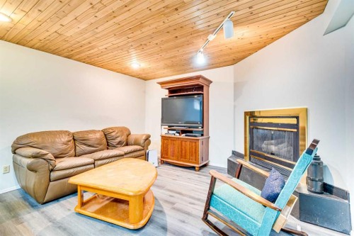 133 6 Avenue Se, Three Hills, AB - Indoor Photo Showing Living Room With Fireplace