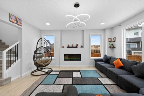 318 Walcrest Way Se, Calgary, AB - Indoor Photo Showing Living Room With Fireplace