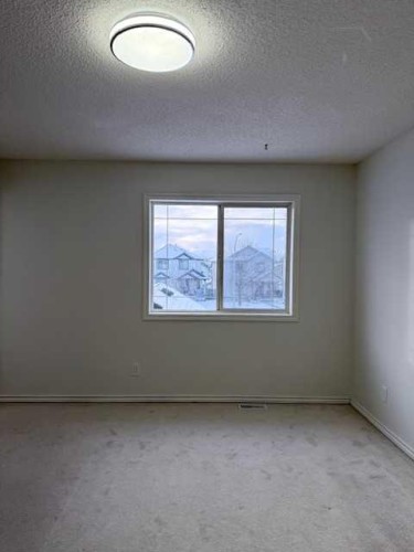 42 Somerside Place Sw, Calgary, AB - Indoor Photo Showing Other Room