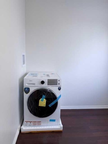 42 Somerside Place Sw, Calgary, AB - Indoor Photo Showing Laundry Room