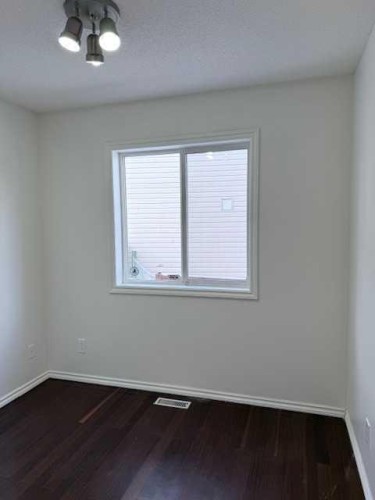 42 Somerside Place Sw, Calgary, AB - Indoor Photo Showing Other Room