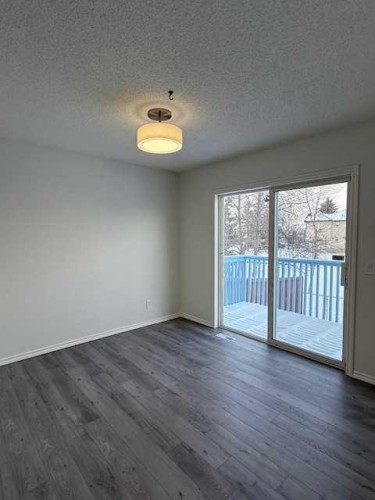 42 Somerside Place Sw, Calgary, AB - Indoor Photo Showing Other Room