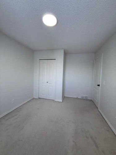 42 Somerside Place Sw, Calgary, AB - Indoor Photo Showing Other Room