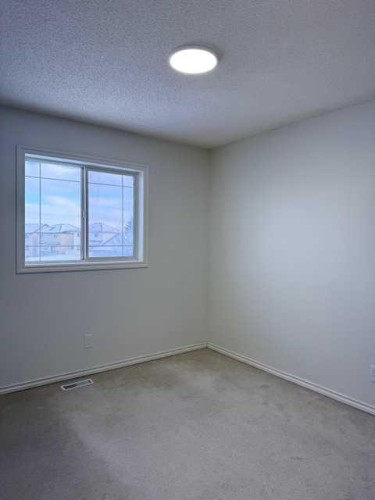 42 Somerside Place Sw, Calgary, AB - Indoor Photo Showing Other Room