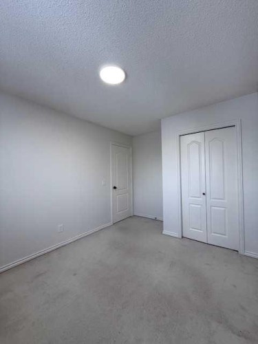 42 Somerside Place Sw, Calgary, AB - Indoor Photo Showing Other Room