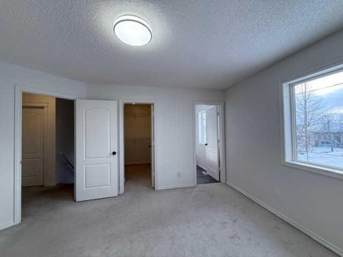 42 Somerside Place Sw, Calgary, AB - Indoor Photo Showing Other Room