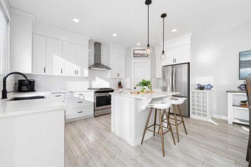 141 Boulder Creek Place, Langdon, AB - Indoor Photo Showing Kitchen With Stainless Steel Kitchen With Upgraded Kitchen