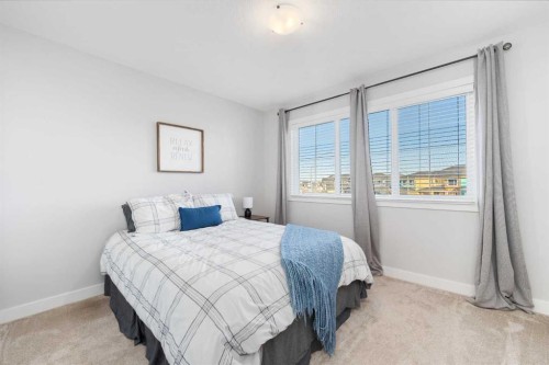 141 Boulder Creek Place, Langdon, AB - Indoor Photo Showing Bedroom