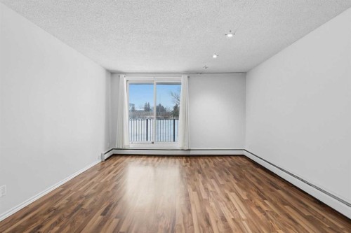 14D-80 Galbraith Drive Sw, Calgary, AB - Indoor Photo Showing Other Room