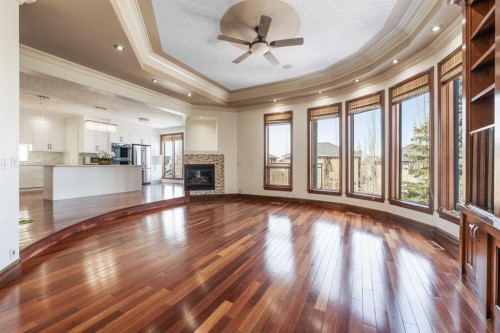 8 Coulee Park Sw, Calgary, AB - Indoor With Fireplace