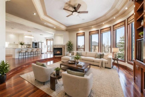 8 Coulee Park Sw, Calgary, AB - Indoor Photo Showing Living Room With Fireplace