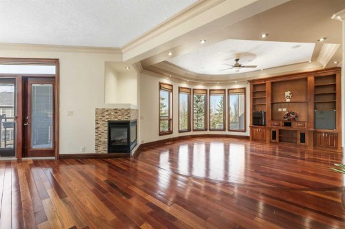 8 Coulee Park Sw, Calgary, AB - Indoor With Fireplace