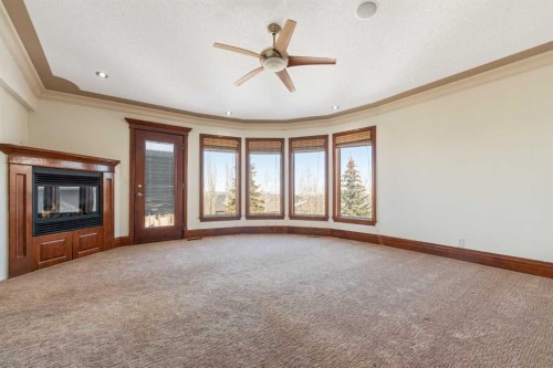 8 Coulee Park Sw, Calgary, AB - Indoor Photo Showing Other Room With Fireplace