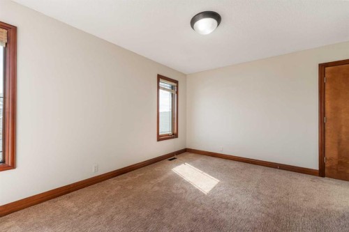 8 Coulee Park Sw, Calgary, AB - Indoor Photo Showing Other Room