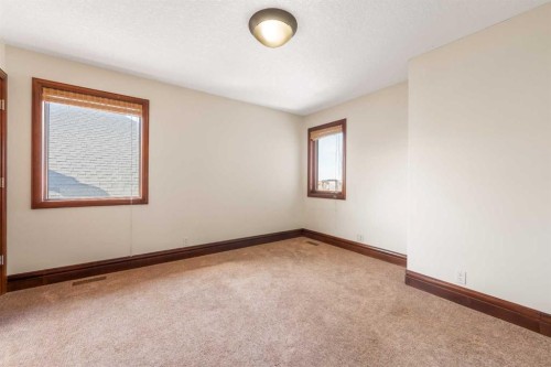 8 Coulee Park Sw, Calgary, AB - Indoor Photo Showing Other Room