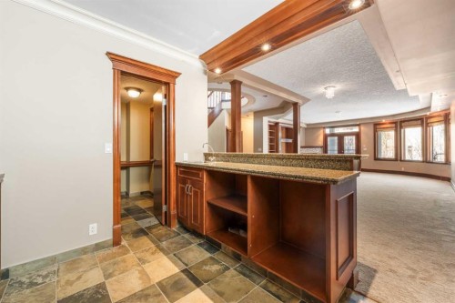 8 Coulee Park Sw, Calgary, AB - Indoor Photo Showing Other Room