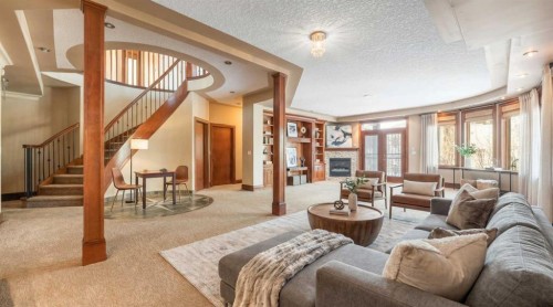 8 Coulee Park Sw, Calgary, AB - Indoor With Fireplace