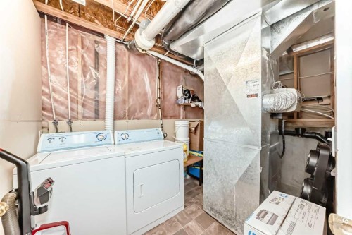 241 Los Alamos Place Ne, Calgary, AB - Indoor Photo Showing Laundry Room
