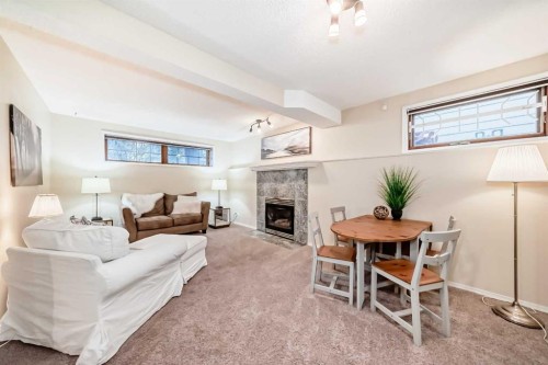 173 Shannon Hill Sw, Calgary, AB - Indoor Photo Showing Living Room With Fireplace