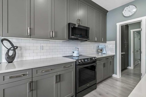 5 Birch Glen, Okotoks, AB - Indoor Photo Showing Kitchen With Upgraded Kitchen
